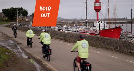 Electric Bike Tour with Strangford Lough Activity Centre in Whiterock with text saying Sold Out