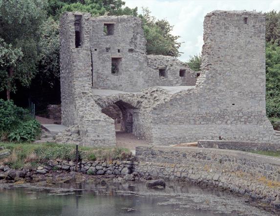 Photo of Mahee Castle, with bridge way and water to forefront