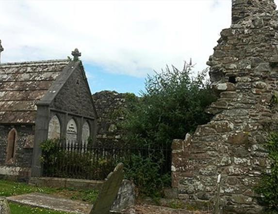 Photograph of the Movilla Abbey, grave stones and ruins