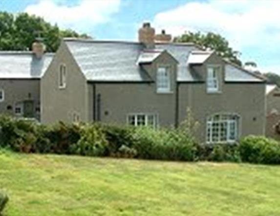 exterior view of cottages and and gardens