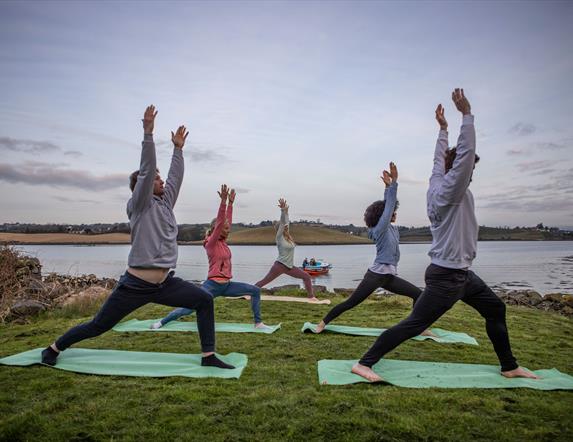 Sunrise SUP & Island Yoga Experience