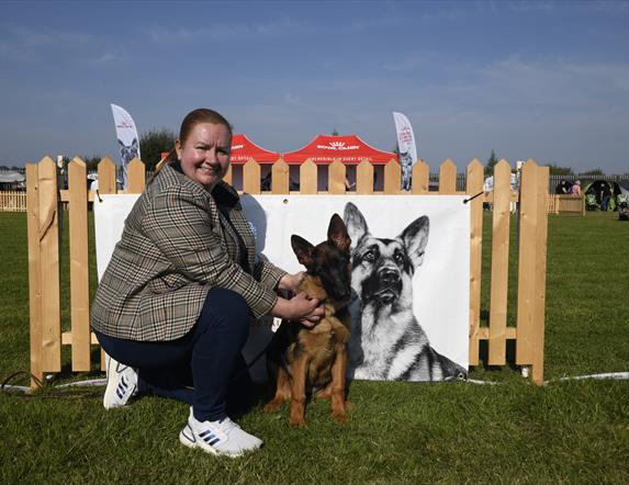 Joanne Westerhouse with her German Shepherd Dog Puppy bitch, Fiadh, just a baby Puppy at the show.