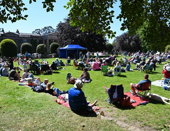 Visitors enjoying jazz on the lawn of Mount Stewart estate