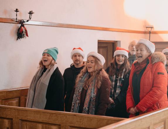 The Fortwilliam Musical Society singing in the Church at Ulster Folk Musuem