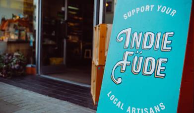 Close up of Indie Füde sign outside of their store