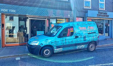 Branded van parked outside of Indie Füde store