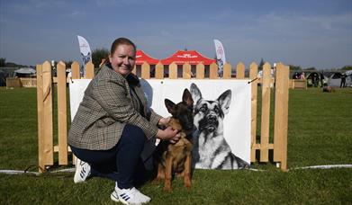 Joanne Westerhouse with her German Shepherd Dog Puppy bitch, Fiadh, just a baby Puppy at the show.