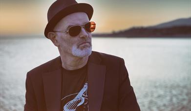 Ben Reel standing at the shore