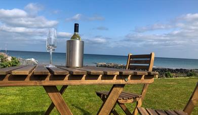 Outdoor seating with view to the sea