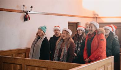 The Fortwilliam Musical Society singing in the Church at Ulster Folk Musuem
