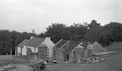 A black and white image of the ulster folk museum 