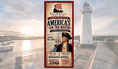 Valhalla Street Theatre poster and an image of Donaghadee lighthouse behind it