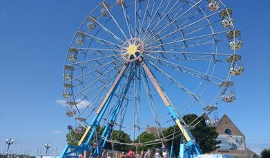 The Panoramic Wheel on daytime at McKee Clock Arena at Bangor seafront