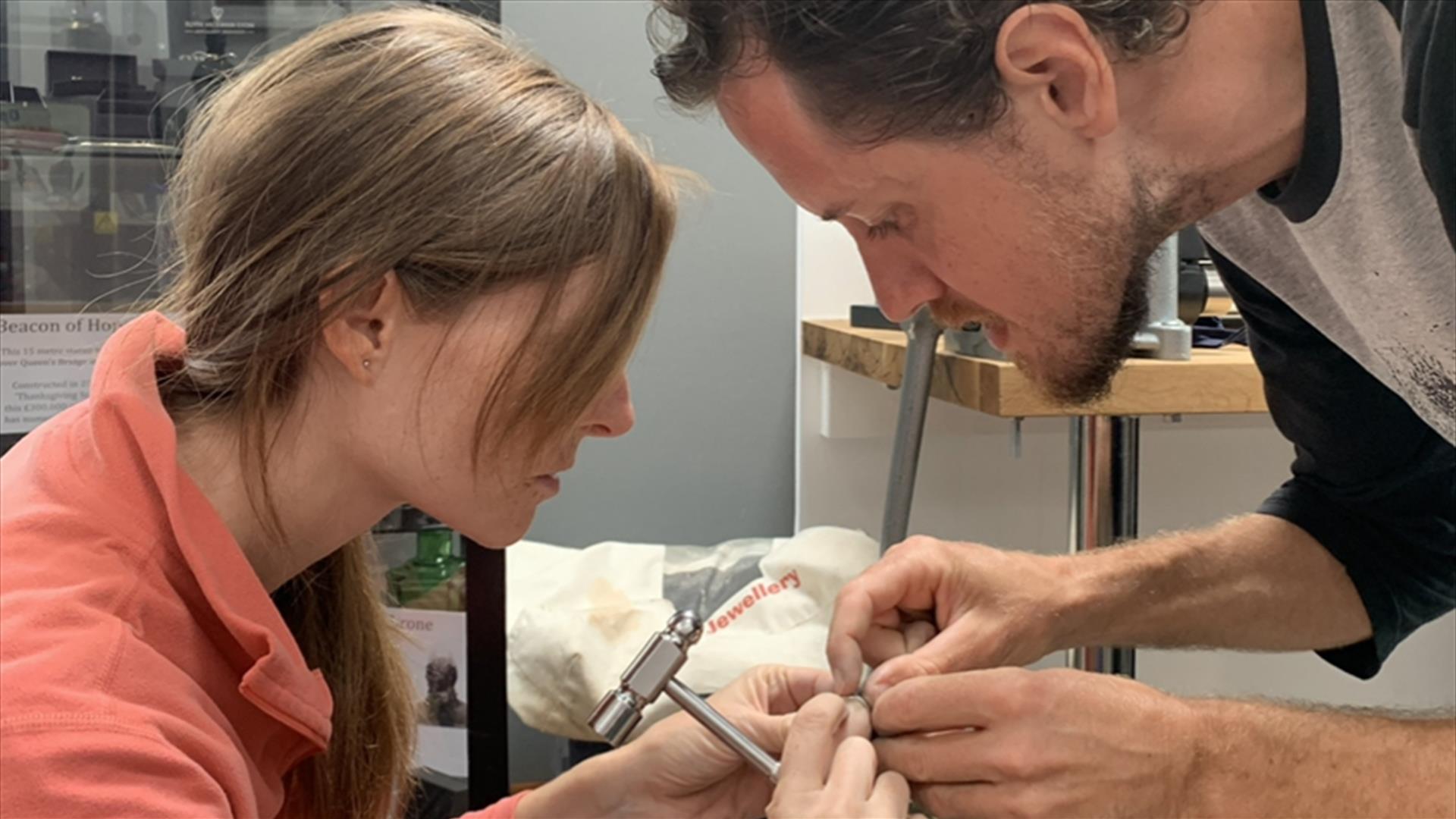 Man and Woman Making Wedding Rings Together