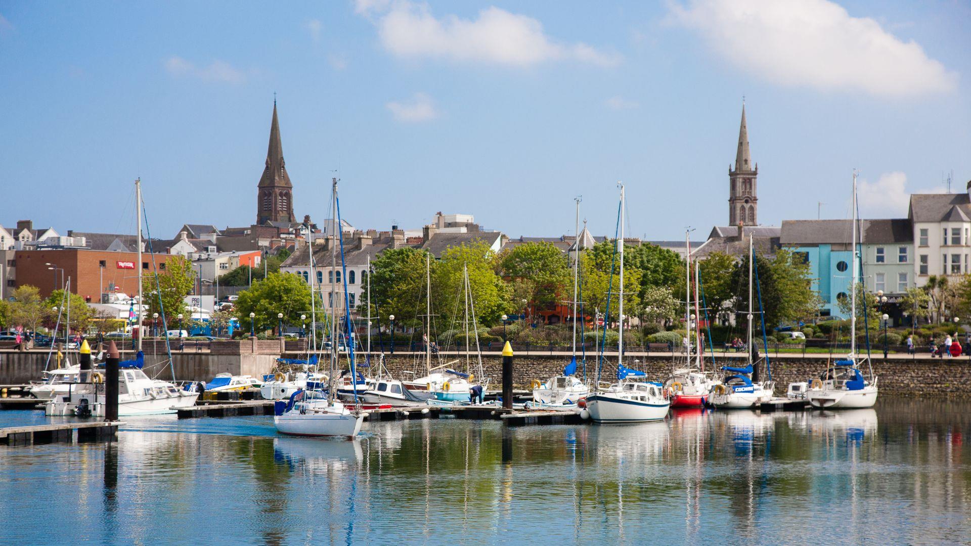 Image of City of Bangor from the Marina with boats in foreground and buildings in background