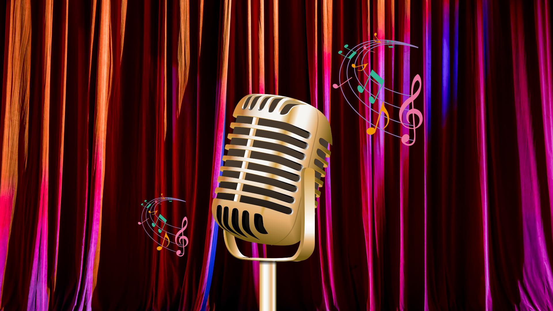 Vintage microphone on stage in front of curtains