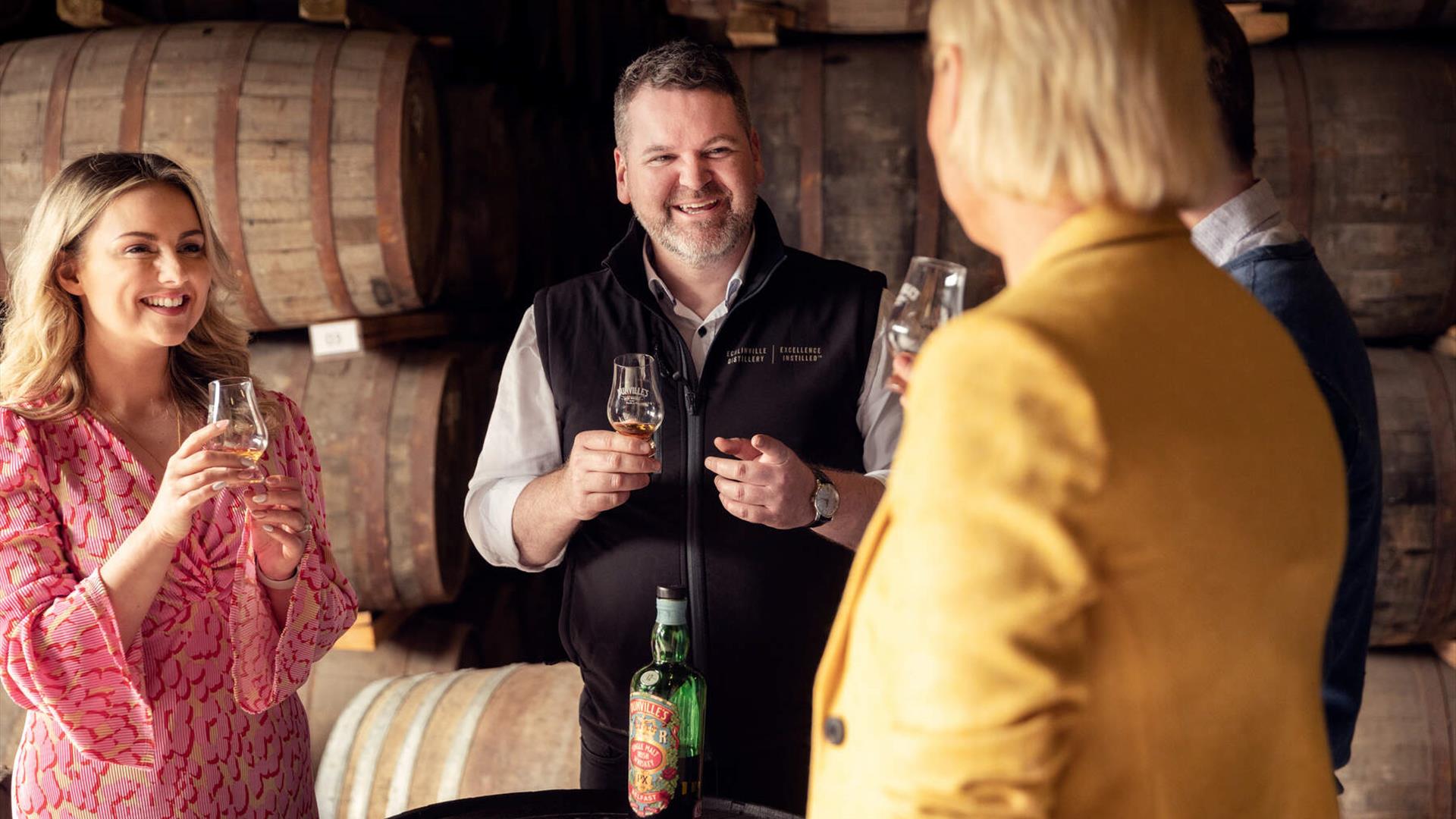 Tour group enjoys a tasting at Echlinville Distillery