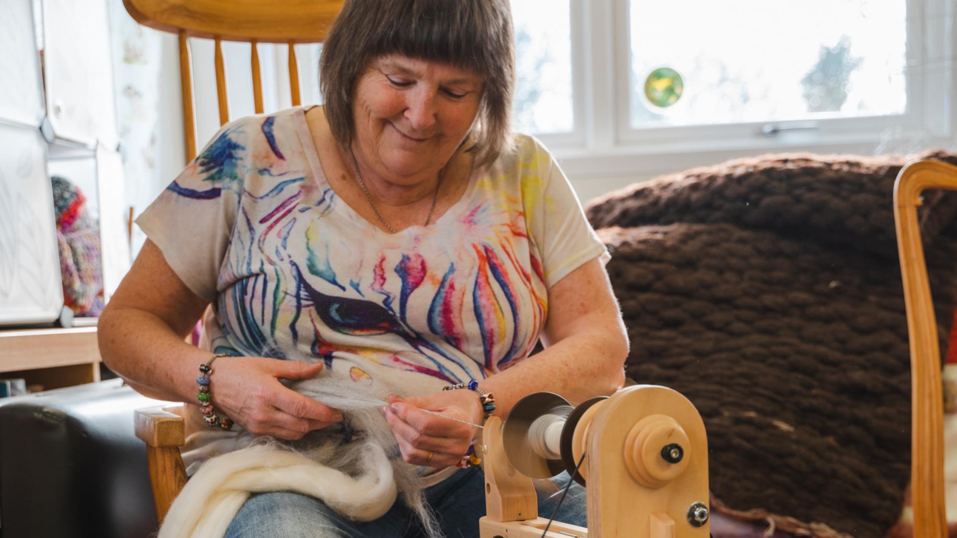 Christine Casey of Kiri Cottage Crafts, spinnging