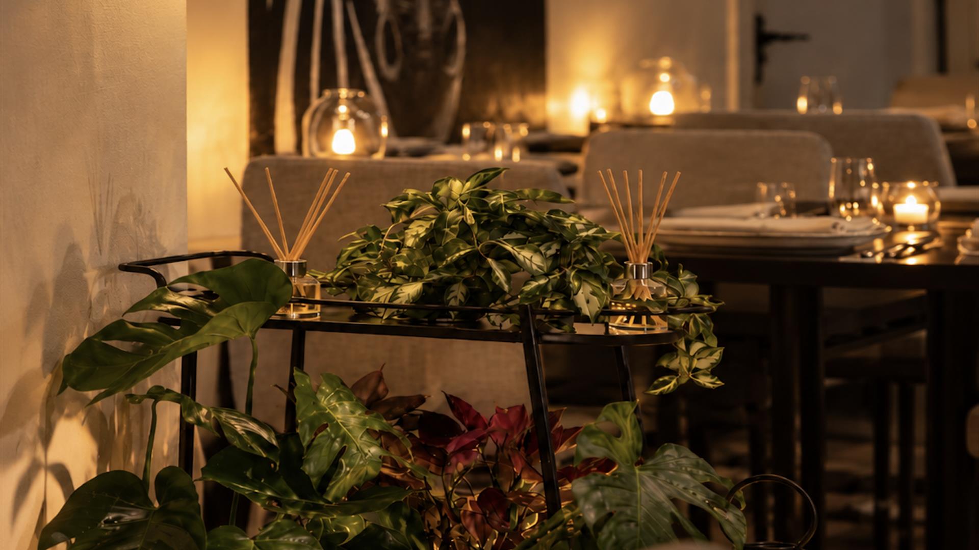 Candlelit dining room at The Manse on the Beach