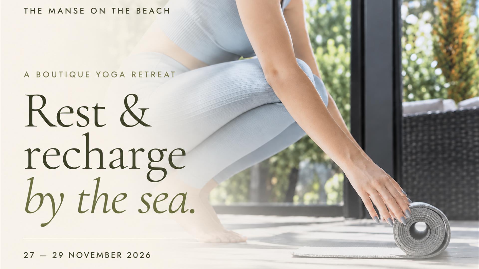 Woman rolling out a yoga mat. The Manse on the Beach boutique yoga retreat, 27–29 November 2026. Rest & recharge by the sea.
