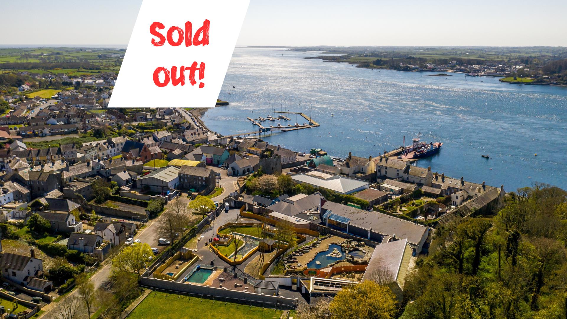 An aerial photo of portaferry with sold out note