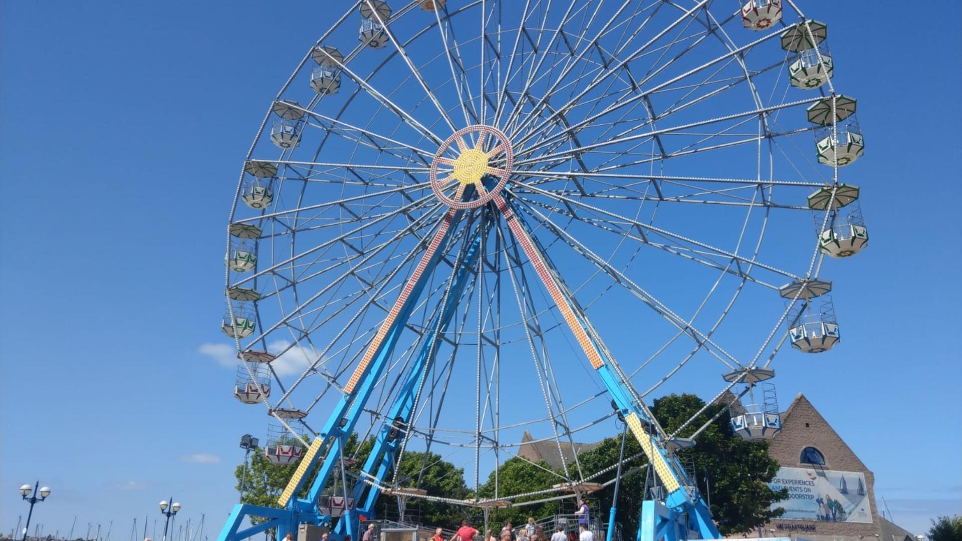 The Panoramic Wheel on daytime at McKee Clock Arena at Bangor seafront