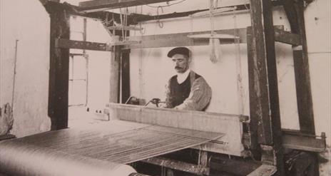 Hand loom weaver at work