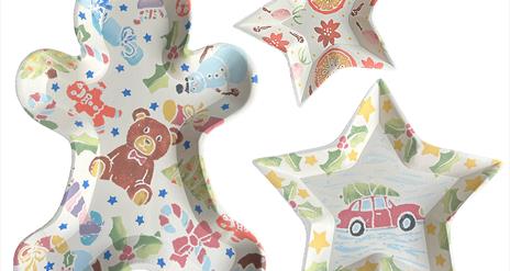 Gingerbread man, large and small star shaped dishes/bowls with Christmas designs printed on them.