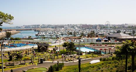 Photo taken on a summers day with a view over Pickie Funpark and the marina