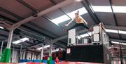 Girl Jumping onto Free Fall Air bag