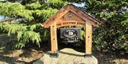 Photo of unique sign to The Potting Shed Spring Cottage Crafts