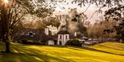 A view of Cultra Inn set amongst the landscaped grounds of the hotel