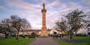 a photo of a monument in the square in comber