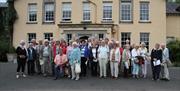 A tour group posing for a photo