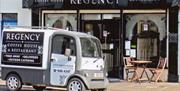 Regency Coffee House branded van sitting outside the coffee house/restaurant