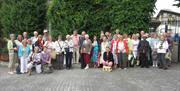 A tour group posing for a photo