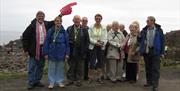 A tour group posing for a photo