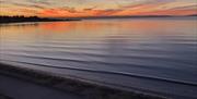 Sunset over the water