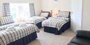 Triple bedroom, one double and two twin beds