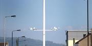 a photograph of a white pole