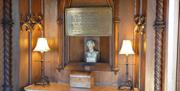 Inside Helen's Tower featuring a plaque of information