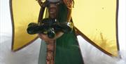 Handmade ornament glass angel holding a shamrock