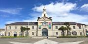 An image of Ards Arts Centre, the old Town Hall, which is the backdrop to the weekly market in Conway Square