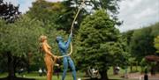 Art & Soul 2025 Sculpture - Two People with Rope Holding Onto a Moon