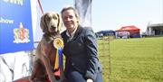 Cathrina Caffrey with her Long Haired Weimaraner, a rare breed in Ireland,  this one imported from Australia. by Catherina Caffrey .  y