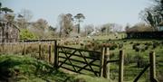 An image of  a gate on a sunny day at Ulster Folk Museum