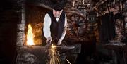 a photograph of a man operating machinery