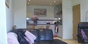 Photo of kitchenette and living room area