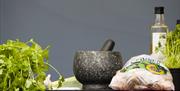 Ingredients and pestle and mortar at the Demo Kitchen