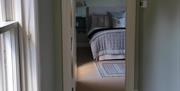 view from hallway into double bedroom